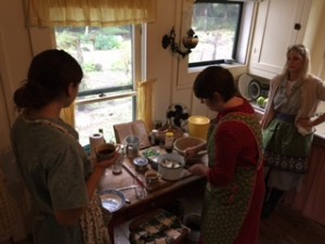 Park Ranger Carrie Todd and volunteers make holiday cookies from Rawlings' cookbook, "Cross Creek Cookery" in Rawlings' kitchen.  In recording Creek life in the 30s, she left more than just a physical legacy.