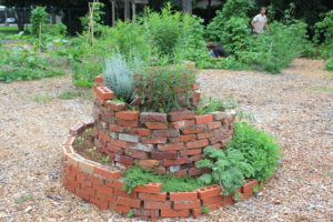 The circular structure of this herb garden allows more to be planted in a smaller space. (Photo: Lisa Grubba)